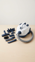 White and navy grooming vacuum canister